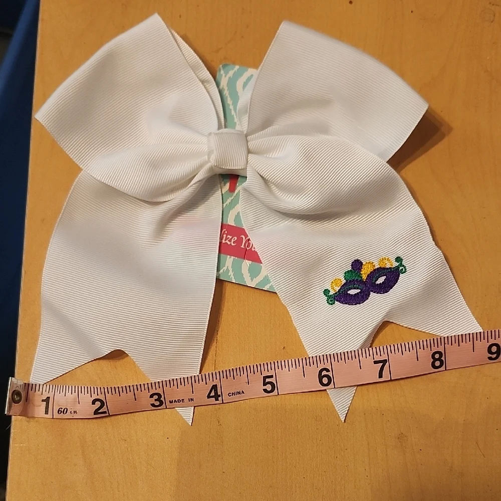 White Embroidered Mardi Gras Design